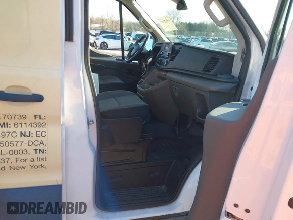 ✅ 2023 Ford Transit Cargo • VIN: 1FTBR1X83PKB98992 • Lot: 43921097. Wystawiony na IAAI z przebiegiem 11 651 mil. Bezpłatny archiwum sprzedaży aukcyjnych z USA i szczegółowy raport historii pojazdu na DreamBid. Zdjęcie 5.