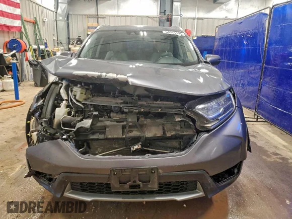 ✅ 2017 Honda CR-V Touring • VIN: 2HKRW2H94HH681590 • Лот: 94311195. Опубліковано раніше на Copart з пробігом 193 757 миль. Безкоштовний доступ до архіву аукціонних продажів зі США та докладний звіт про історію автомобіля на DreamBid. Зображення 5.