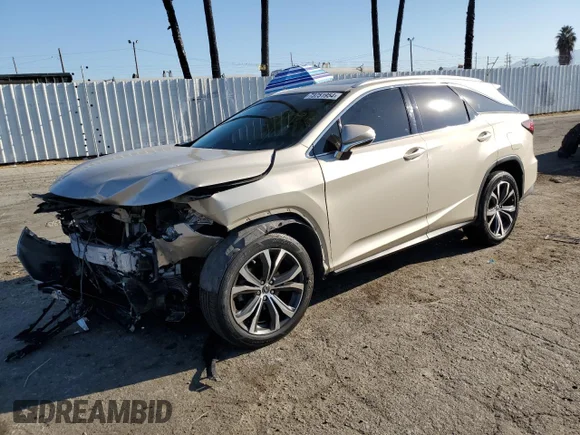 ✅ 2019 Lexus RX 350L Premium • VIN: JTJDZKCAXK2018257 • Lot: 73751954. Listed on Copart with 119,569 mi. Free auction sales archive from the USA and detailed vehicle history report at DreamBid. Image 1.