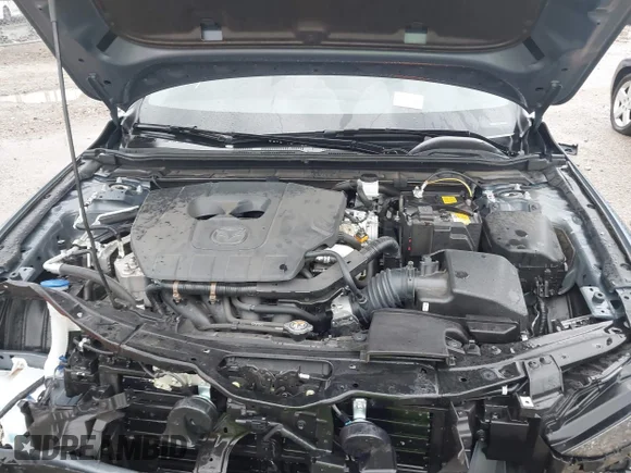 ✅ 2025 Mazda 3 S Carbon Edition • VIN: JM1BPBLM8S1757885 • Лот: 43722975. Опубліковано раніше на IAAI з пробігом 12 561 миль. Безкоштовний доступ до архіву аукціонних продажів зі США та докладний звіт про історію автомобіля на DreamBid. Зображення 10.
