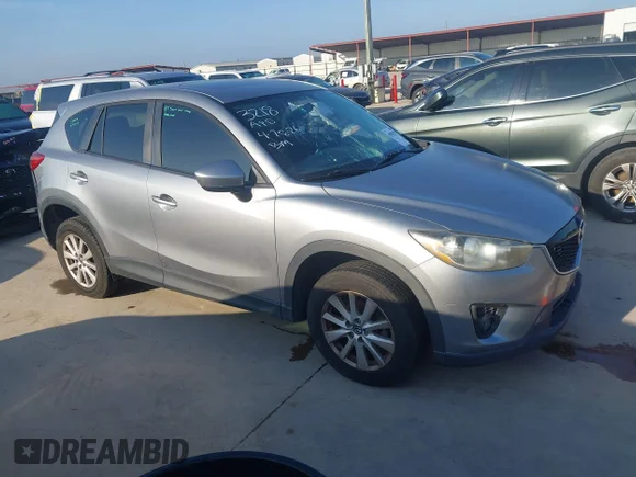 ✅ 2014 Mazda CX-5 Touring • VIN: JM3KE2CY9E0303218 • Лот: 45082537. Опубликован ранее на IAAI с пробегом Не указан. Бесплатный доступ к архиву аукционных продаж из США и подробный отчёт об истории автомобиля на DreamBid. Изображение 1.