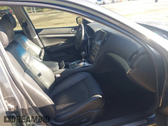 ✅ 2015 Infiniti Q40 • VIN: JN1CV6AR7FM651080 • Лот: 45091396. Опубліковано раніше на IAAI з пробігом 105 948 миль. Безкоштовний доступ до архіву аукціонних продажів зі США та докладний звіт про історію автомобіля на DreamBid. Зображення 5.