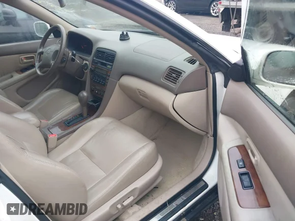 ✅ 2000 Lexus ES 300 • VIN: JT8BF28G3Y0246877 • Lot: 40365916. Wystawiony na IAAI z przebiegiem 153 569 mil. Bezpłatny archiwum sprzedaży aukcyjnych z USA i szczegółowy raport historii pojazdu na DreamBid. Zdjęcie 5.