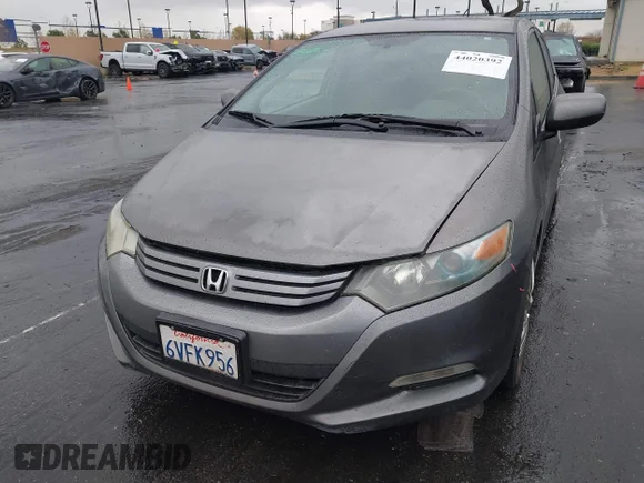 ✅ 2010 Honda Insight LX • VIN: JHMZE2H57AS036244 • Лот: 44020392. Опубліковано раніше на IAAI з пробігом 238 400 миль. Безкоштовний доступ до архіву аукціонних продажів зі США та докладний звіт про історію автомобіля на DreamBid. Зображення 6.