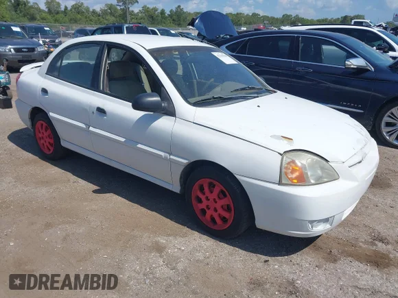 ✅ 2003 Kia Rio • VIN: KNADC125136252944 • Lot: 42365048. Wystawiony na IAAI z przebiegiem 146 912 mil. Bezpłatny archiwum sprzedaży aukcyjnych z USA i szczegółowy raport historii pojazdu na DreamBid. Zdjęcie 1.