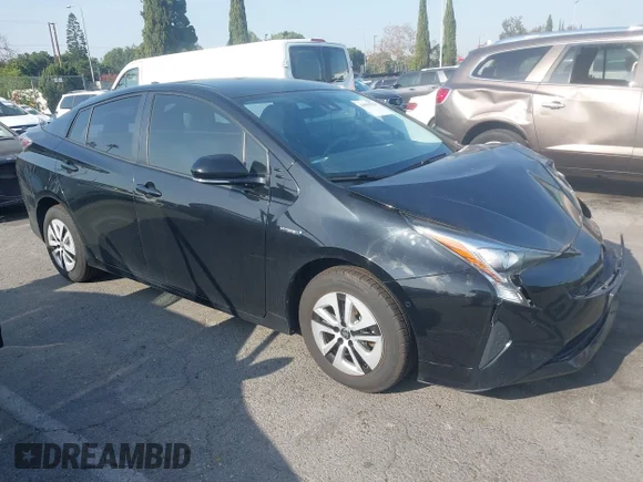 ✅ 2017 Toyota Prius Three Touring • VIN: JTDKARFUXH3047194 • Lot: 43991513. Listed on IAAI with 94,372 mi. Free auction sales archive from the USA and detailed vehicle history report at DreamBid. Image 1.