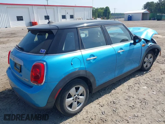 ✅ 2015 MINI Hardtop 4 Door • VIN: WMWXS5C56FT831505 • Лот: 42155398. Опубліковано раніше на IAAI з пробігом 95 693 миль. Безкоштовний доступ до архіву аукціонних продажів зі США та докладний звіт про історію автомобіля на DreamBid. Зображення 4.