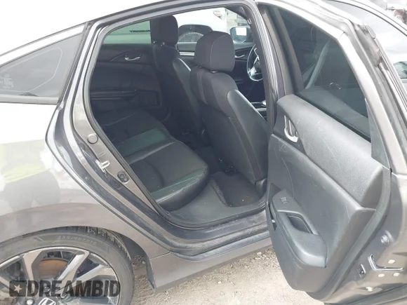 ✅ 2019 Honda Civic Sport • VIN: 19XFC2F83KE043283 • Lot: 43386888. Wystawiony na IAAI z przebiegiem Nie podano. Bezpłatny archiwum sprzedaży aukcyjnych z USA i szczegółowy raport historii pojazdu na DreamBid. Zdjęcie 8.