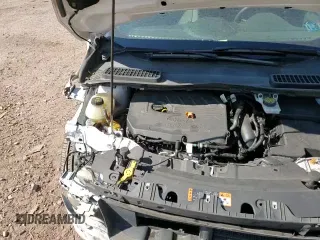 2018 Ford Escape SE z VIN 1FMCU9GD6JUA15204, wystawiony jako Copart lot #70722475 z przebiegiem 116 486 mil mil oraz Szkoda całkowita • Salvage title. Historia ofert i sprzedaży dostępna na DreamBid. Obrazek 17.