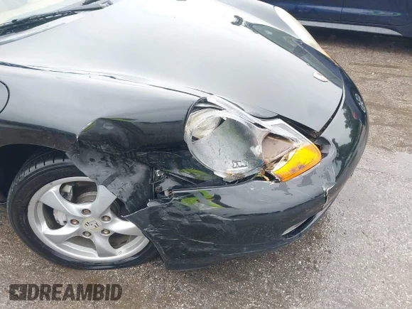 ✅ 2002 Porsche Boxster • VIN: WP0CA29822S620211 • Lot: 43429480. Wystawiony na IAAI z przebiegiem 71 344 mil. Bezpłatny archiwum sprzedaży aukcyjnych z USA i szczegółowy raport historii pojazdu na DreamBid. Zdjęcie 6.