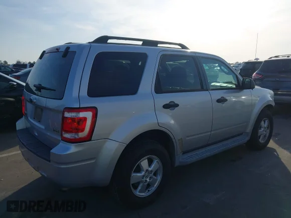 ✅ 2010 Ford Escape XLT • VIN: 1FMCU9DG5AKB81093 • Лот: 44524157. Опубликован ранее на IAAI с пробегом 93 022 миль. Бесплатный доступ к архиву аукционных продаж из США и подробный отчёт об истории автомобиля на DreamBid. Изображение 4.