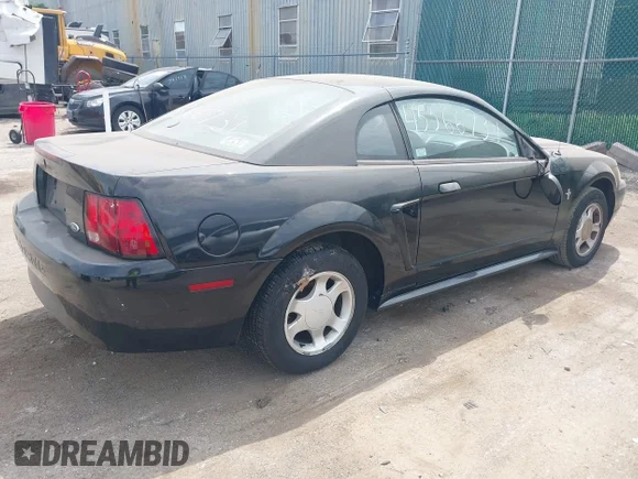✅ 2000 Ford Mustang • VIN: 1FAFP404XYF117325 • Lot: 45566731. Listed on IAAI with 144,249 mi. Free auction sales archive from the USA and detailed vehicle history report at DreamBid. Image 4.