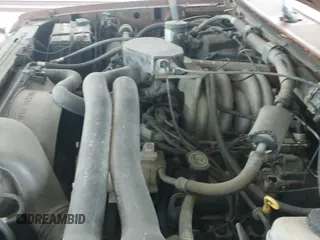 ✅ 1990 Ford F-150 • VIN: 1FTEX15H9LKA97486 • Lot: 42946470. Wystawiony na IAAI z przebiegiem 765 562 mil. Bezpłatny archiwum sprzedaży aukcyjnych z USA i szczegółowy raport historii pojazdu na DreamBid. Zdjęcie 13.