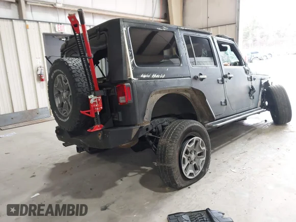 ✅ 2015 Jeep Wrangler Unlimited Sahara • VIN: 1C4HJWEG2FL647659 • Lot: 43971123. Wystawiony na IAAI z przebiegiem 74 623 mil. Bezpłatny archiwum sprzedaży aukcyjnych z USA i szczegółowy raport historii pojazdu na DreamBid. Zdjęcie 4.