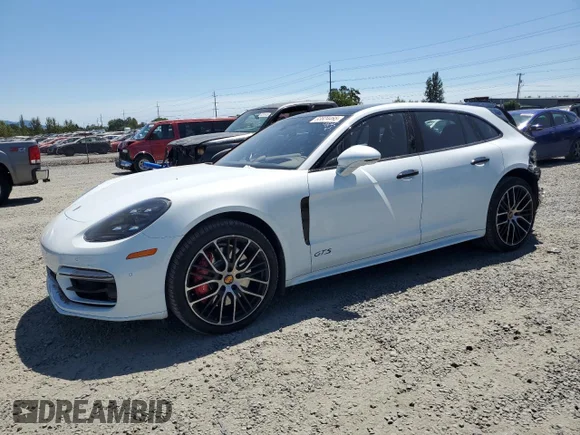 ✅ 2023 Porsche Panamera • VIN: WP0CG2A72PL163046 • Lot: 63824465. Listed on Copart with 15,292 mi. Free auction sales archive from the USA and detailed vehicle history report at DreamBid. Image 1.