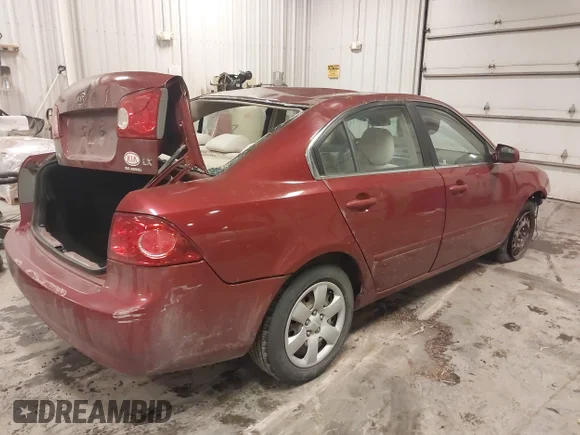 ✅ 2006 Kia Optima LX • VIN: KNAGE123965020172 • Лот: 41252873. Опубліковано раніше на IAAI з пробігом 164 825 миль. Безкоштовний доступ до архіву аукціонних продажів зі США та докладний звіт про історію автомобіля на DreamBid. Зображення 4.