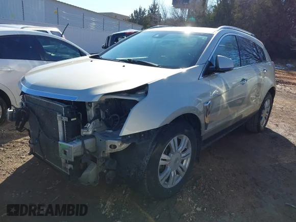 ✅ 2014 Cadillac SRX Luxury Collection • VIN: 3GYFNBE33ES579831 • Lot: 41290645. Wystawiony na IAAI z przebiegiem 155 987 mil. Bezpłatny archiwum sprzedaży aukcyjnych z USA i szczegółowy raport historii pojazdu na DreamBid. Zdjęcie 2.