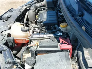 2015 Chevrolet Sonic LT z VIN 1G1JC6SB3F4108765, wystawiony jako IAAI lot #42570077 z przebiegiem 67 888 mil mil oraz . Historia ofert i sprzedaży dostępna na DreamBid. Obrazek 12.