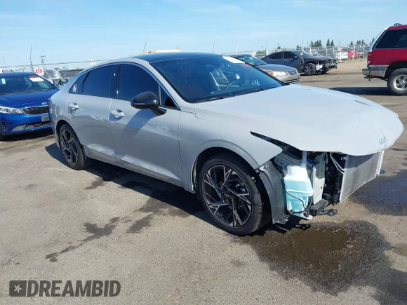✅ 2025 Kia K5 GT-Line • VIN: KNAG64J74S5300840 • Лот: 42335230. Опубліковано раніше на IAAI з пробігом 5 972 миль. Безкоштовний доступ до архіву аукціонних продажів зі США та докладний звіт про історію автомобіля на DreamBid. Зображення 1.