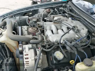 ✅ 2003 Ford Mustang Standard • VIN: 1FAFP40403F357007 • Lot: 42372835. Listed on IAAI with 165,641 mi. Free auction sales archive from the USA and detailed vehicle history report at DreamBid. Image 12.