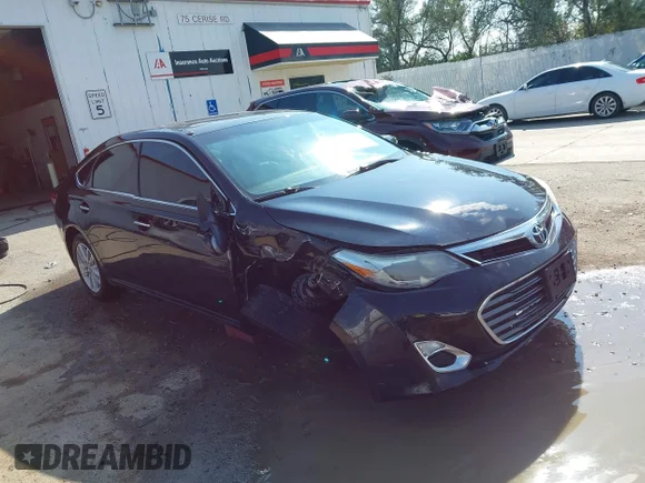✅ 2013 Toyota Avalon Limited • VIN: 4T1BK1EB1DU029990 • Lot: 43258159. Listed on IAAI with 105,858 mi. Free auction sales archive from the USA and detailed vehicle history report at DreamBid. Image 1.