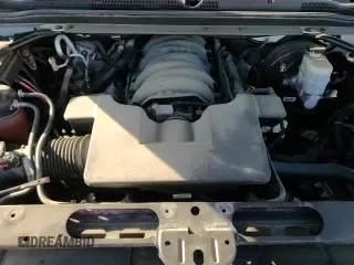 ✅ 2018 Chevrolet Tahoe LT • VIN: 1GNSKBKC7JR372915 • Lot: 84171665. Listed on Copart with 103,851 mi. Free auction sales archive from the USA and detailed vehicle history report at DreamBid. Image 15.