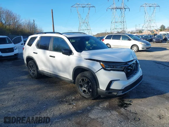 ✅ 2024 Honda Pilot TrailSport • VIN: 5FNYG1H69RB029265 • Лот: 43796095. Опубликован ранее на IAAI с пробегом 22 734 миль. Бесплатный доступ к архиву аукционных продаж из США и подробный отчёт об истории автомобиля на DreamBid. Изображение 1.