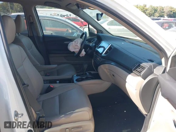 ✅ 2017 Honda Pilot EX-L • VIN: 5FNYF5H76HB027541 • Lot: 43428274. Listed on IAAI with 142,113 mi. Free auction sales archive from the USA and detailed vehicle history report at DreamBid. Image 5.