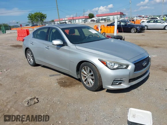 ✅ 2015 Infiniti Q50 Hybrid Premium • VIN: JN1AV7AP4FM790045 • Lot: 42862007. Listed on IAAI with 124,103 mi. Free auction sales archive from the USA and detailed vehicle history report at DreamBid. Image 1.
