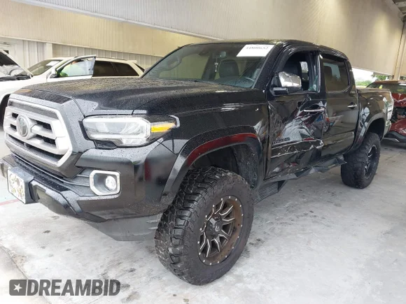 ✅ 2021 Toyota Tacoma Limited • VIN: 3TMGZ5AN5MM434462 • Lot: 44800652. Wystawiony na IAAI z przebiegiem 76 215 mil. Bezpłatny archiwum sprzedaży aukcyjnych z USA i szczegółowy raport historii pojazdu na DreamBid. Zdjęcie 2.
