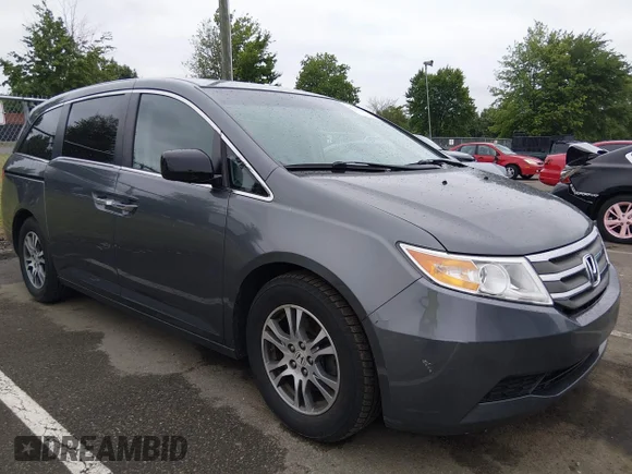 ✅ 2012 Honda Odyssey EX-L • VIN: 5FNRL5H66CB024751 • Lot: 45459607. Listed on IAAI with 145,858 mi. Free auction sales archive from the USA and detailed vehicle history report at DreamBid. Image 6.