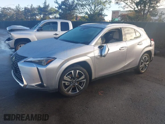 ✅ 2025 Lexus UX 300h Premium • VIN: JTHYBJAHXS2034069 • Лот: 44406550. Опубліковано раніше на IAAI з пробігом 4 856 миль. Безкоштовний доступ до архіву аукціонних продажів зі США та докладний звіт про історію автомобіля на DreamBid. Зображення 2.