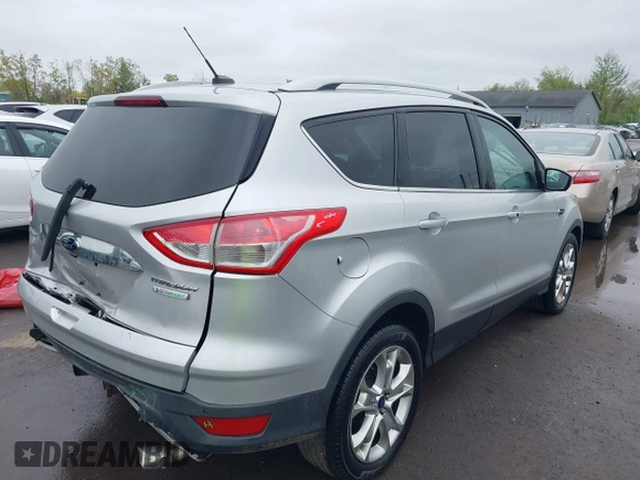 ✅ 2014 Ford Escape Titanium • VIN: 1FMCU0J95EUE10951 • Lot: 44993353. Wystawiony na IAAI z przebiegiem 105 969 mil. Bezpłatny archiwum sprzedaży aukcyjnych z USA i szczegółowy raport historii pojazdu na DreamBid. Zdjęcie 4.