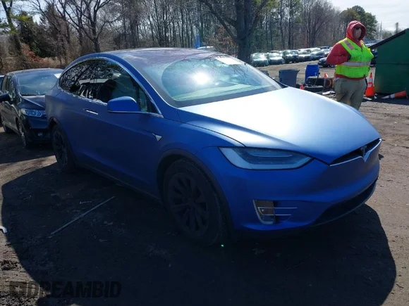 ✅ 2019 Tesla Model X 75D • VIN: 5YJXCBE28KF186404 • Lot: 41815026. Listed on IAAI with 72,454 mi. Free auction sales archive from the USA and detailed vehicle history report at DreamBid. Image 1.