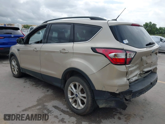 ✅ 2018 Ford Escape SE • VIN: 1FMCU0GDXJUB24602 • Lot: 44820852. Wystawiony na IAAI z przebiegiem 175 096 mil. Bezpłatny archiwum sprzedaży aukcyjnych z USA i szczegółowy raport historii pojazdu na DreamBid. Zdjęcie 3.
