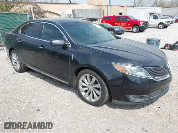 ✅ 2015 Lincoln MKS • VIN: 1LNHL9DKXFG602619 • Lot: 44706190. Listed on IAAI with 266,201 mi. Free auction sales archive from the USA and detailed vehicle history report at DreamBid. Image 1.