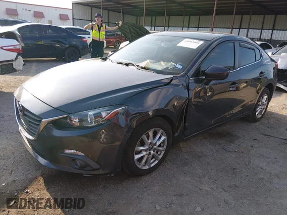 ✅ 2016 Mazda 3 i Touring • VIN: 3MZBM1W76GM262651 • Lot: 44892008. Wystawiony na IAAI z przebiegiem 118 934 mil. Bezpłatny archiwum sprzedaży aukcyjnych z USA i szczegółowy raport historii pojazdu na DreamBid. Zdjęcie 2.