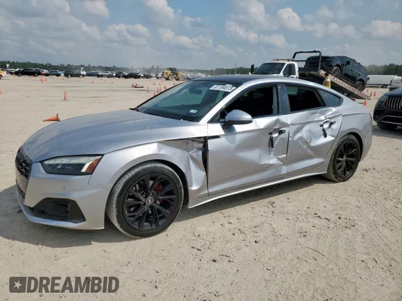 ✅ 2023 Audi A5 Sportback Premium Plus • VIN: WAUCBCF57PA046986 • Lot: 81199575. Listed on Copart with 36,718 mi. Free auction sales archive from the USA and detailed vehicle history report at DreamBid. Image 1.