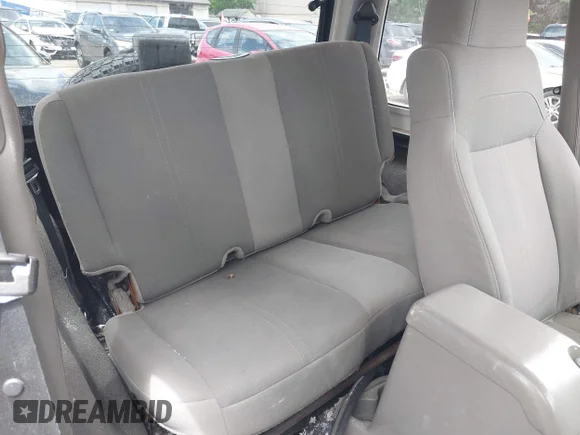 ✅ 2003 Jeep Wrangler Sahara • VIN: 1J4FA59S53P361996 • Lot: 45244641. Listed on IAAI with 247,073 mi. Free auction sales archive from the USA and detailed vehicle history report at DreamBid. Image 8.