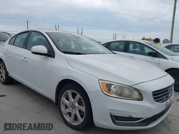 ✅ 2015 Volvo S60 T5 Drive-E • VIN: YV126MFJ8F2360316 • Lot: 42829367. Listed on IAAI with 105,872 mi. Free auction sales archive from the USA and detailed vehicle history report at DreamBid. Image 1.
