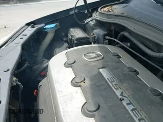 ✅ 2006 Acura MDX Touring • VIN: 2HNYD18656H542618 • Lot: 42730916. Wystawiony na IAAI z przebiegiem 157 705 mil. Bezpłatny archiwum sprzedaży aukcyjnych z USA i szczegółowy raport historii pojazdu na DreamBid. Zdjęcie 12.