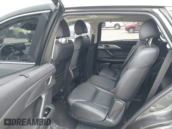 ✅ 2019 Mazda CX-9 Touring • VIN: JM3TCACY6K0336774 • Lot: 41398983. Wystawiony na IAAI z przebiegiem 90 016 mil. Bezpłatny archiwum sprzedaży aukcyjnych z USA i szczegółowy raport historii pojazdu na DreamBid. Zdjęcie 8.