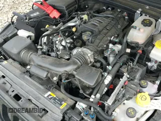 ✅ 2023 Jeep Wrangler Willys • VIN: 1C4HJXDG0PW617101 • Lot: 42111687. Listed on IAAI with 56,415 mi. Free auction sales archive from the USA and detailed vehicle history report at DreamBid. Image 20.