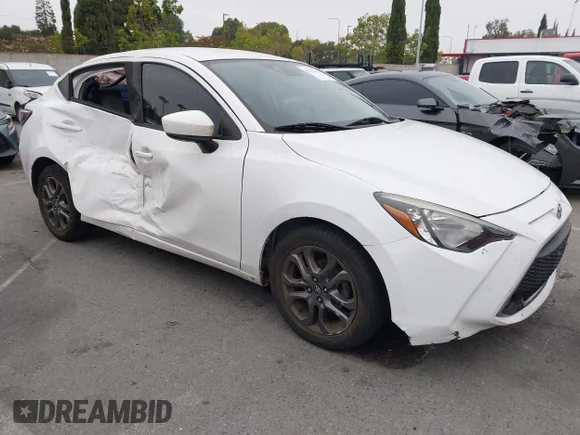 ✅ 2019 Toyota Yaris L • VIN: 3MYDLBYV4KY509989 • Лот: 45292839. Опубликован ранее на IAAI с пробегом 57 018 миль. Бесплатный доступ к архиву аукционных продаж из США и подробный отчёт об истории автомобиля на DreamBid. Изображение 1.