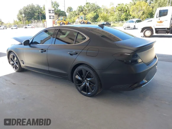 ✅ 2023 Genesis G70 2.0T • VIN: KMTG34TA6PU111819 • Lot: 43427252. Wystawiony na IAAI z przebiegiem 33 156 mil. Bezpłatny archiwum sprzedaży aukcyjnych z USA i szczegółowy raport historii pojazdu na DreamBid. Zdjęcie 3.