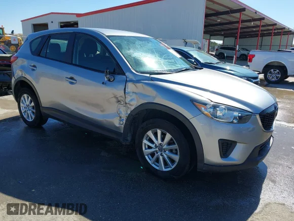 ✅ 2014 Mazda CX-5 Sport • VIN: JM3KE4BE9E0402463 • Lot: 44452731. Listed on IAAI with 90,866 mi. Free auction sales archive from the USA and detailed vehicle history report at DreamBid. Image 1.