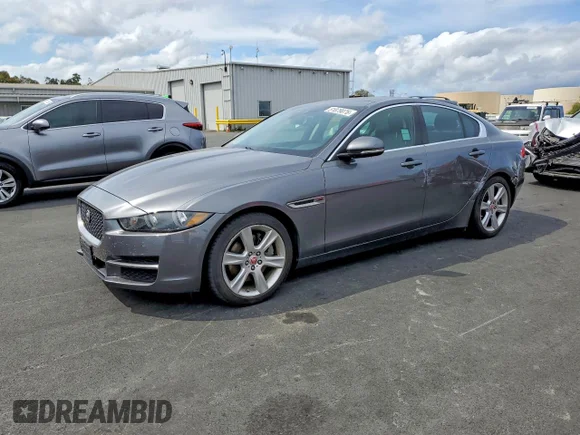 ✅ 2017 Jaguar XE 25t Prestige • VIN: SAJAE4BGXHA963759 • Лот: 51879076. Опубликован ранее на Copart с пробегом 77 298 миль. Бесплатный доступ к архиву аукционных продаж из США и подробный отчёт об истории автомобиля на DreamBid. Изображение 1.