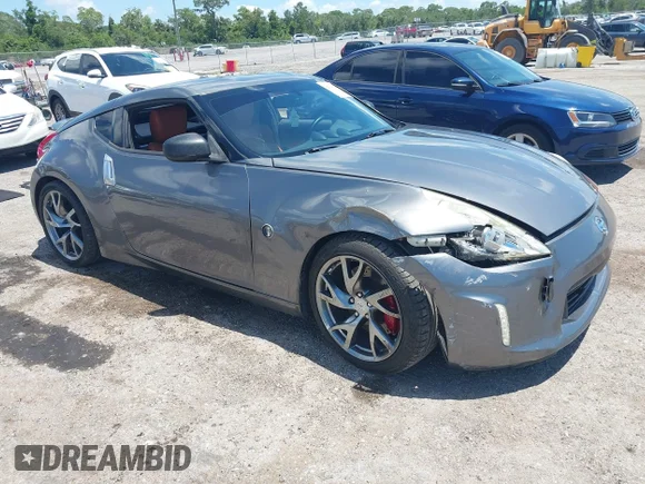 ✅ 2013 Nissan 370Z Touring • VIN: JN1AZ4EH2DM384011 • Lot: 42274166. Wystawiony na IAAI z przebiegiem 87 499 mil. Bezpłatny archiwum sprzedaży aukcyjnych z USA i szczegółowy raport historii pojazdu na DreamBid. Zdjęcie 1.