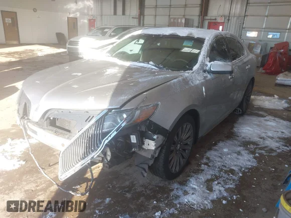 ✅ 2013 Lincoln MKS • VIN: 1LNHL9DK0DG604568 • Лот: 41339724. Опубліковано раніше на IAAI з пробігом 186 448 миль. Безкоштовний доступ до архіву аукціонних продажів зі США та докладний звіт про історію автомобіля на DreamBid. Зображення 2.