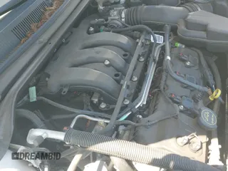 ✅ 2015 Ford Taurus SE • VIN: 1FAHP2D86FG183680 • Лот: 43181419. Опубликован ранее на IAAI с пробегом 150 824 миль. Бесплатный доступ к архиву аукционных продаж из США и подробный отчёт об истории автомобиля на DreamBid. Изображение 13.